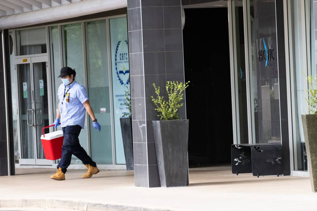 A worker leaves Canberra's only quarantine hotel, Pacific Suites on Northbourne Avenue. Picture: Keegan Carroll 