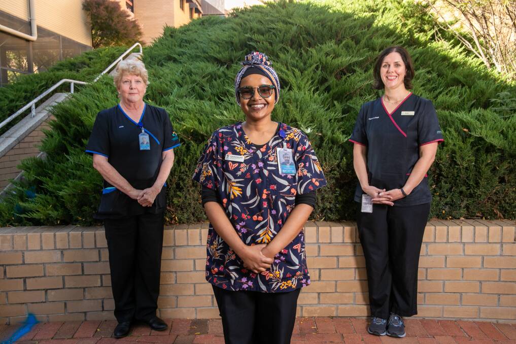 Canberra Hospital assistant director of nursing Wendy Beckingham with nurse Farida Kavata and clinical midwifery manager Wendy Alder. Picture: Keegan Carroll