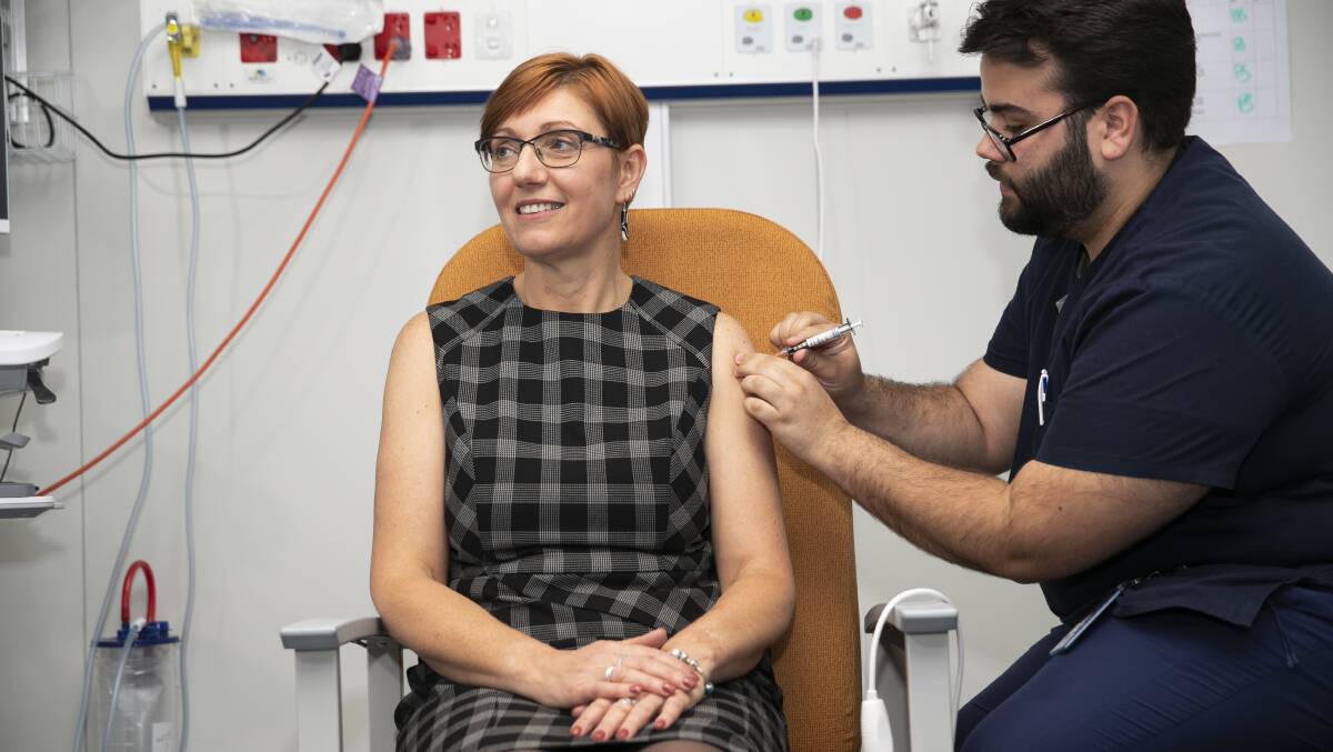 ACT Health Minister Rachel Stephen-Smith getting a Covid vaccine on Thursday. Picture: Keegan Carroll 