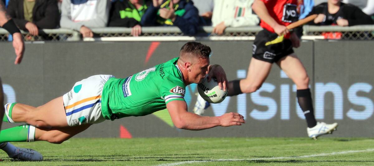 FINE FORM: Canberra's Jack Wighton scores a try in Saturday's NRL win over Penrith at Wagga. Picture: Les Smith. 