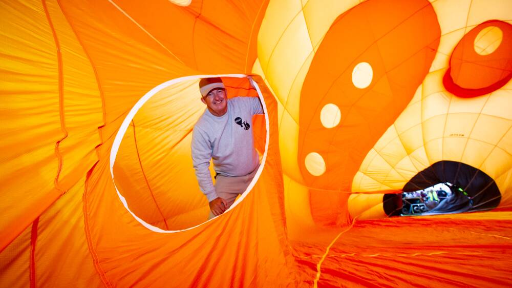Balloonist Craig Farrell inside the giant 33-metre tall Tico the sloth balloon. Picture: Elesa Kurtz 
