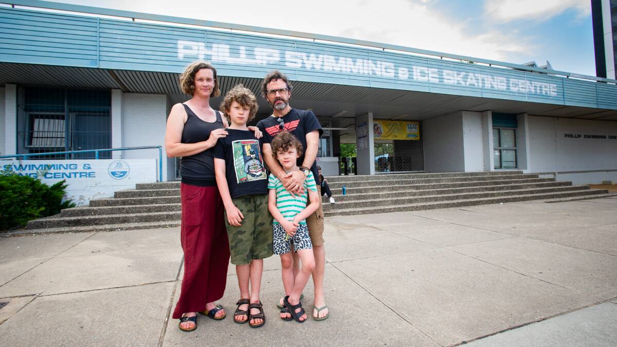 Sarah and Tim Ransom and their children use Phillip Swimming pool regularly and are concerned about its future. Picture by Elesa Kurtz