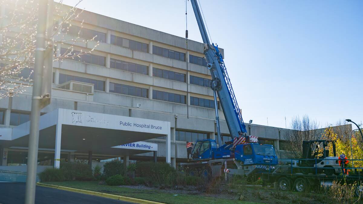 Calvary branding being removed from the Bruce hospital in July. Picture by Elesa Kurtz 