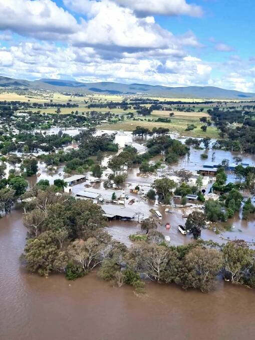 Flash flooding swept through Eugowra on Monday morning, with residents airlifted from roofs. Picture Toll Ambulance