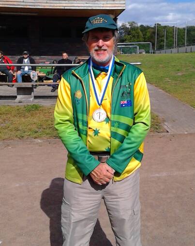 Stuart Atkins with his gold medal in Germany. Picture: Supplied.