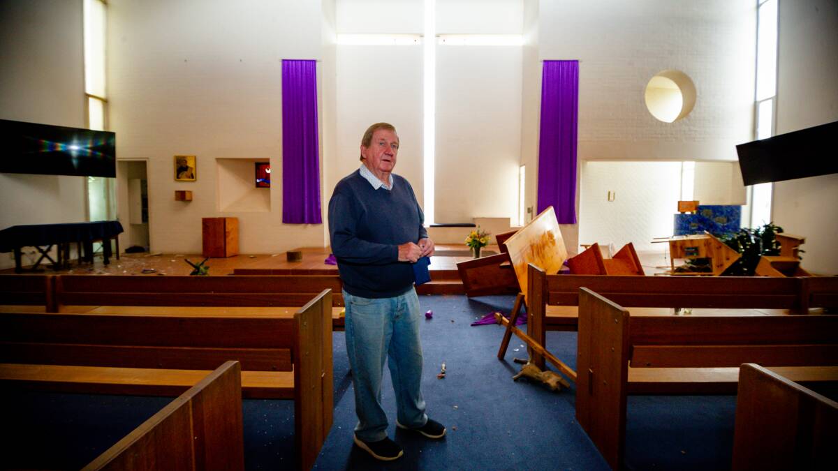 Parishioner Bill Fitzpatrick at the St Thomas Aquinas church after it was vandalised yesterday. Picture: Elesa Kurtz