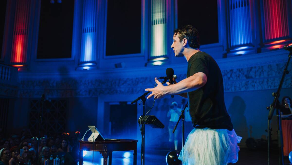 Samuel Johnson sings to the Pub Choir crowd during a performance at Brisbane City Hall on December 20, 2018. Photo: Jacob Morrison