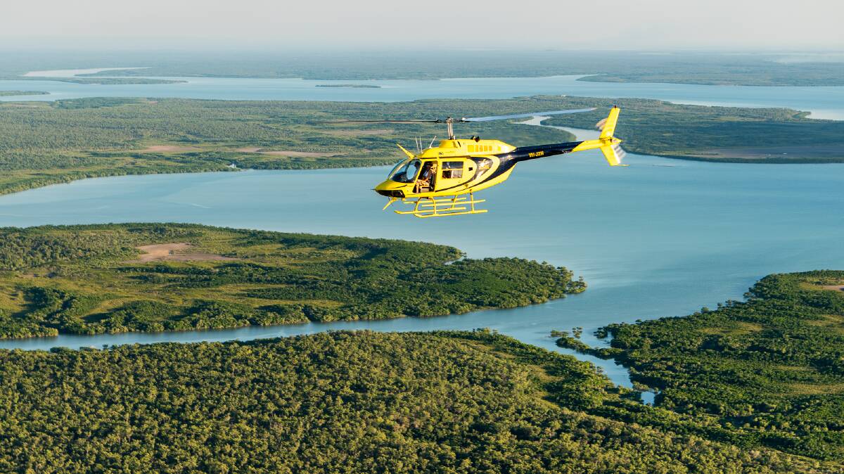 The helicopter pub crawl offers stunning views of the landscapes around Darwin. Picture: Michael Turtle