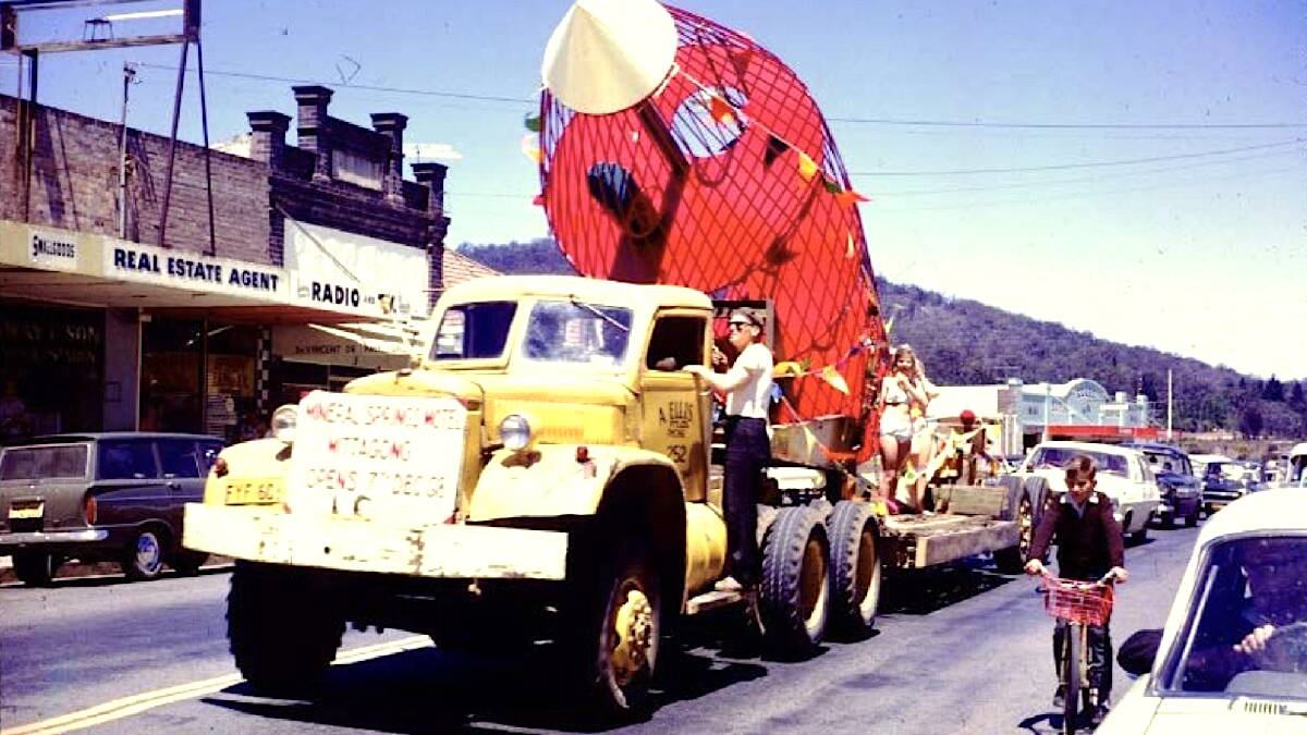 The Mittagong rocket, a favourite with many Canberrans parades through the Southern Highlands town before being erected at Winifred Park in November 1968. Picture: BDHS and S Hawkins