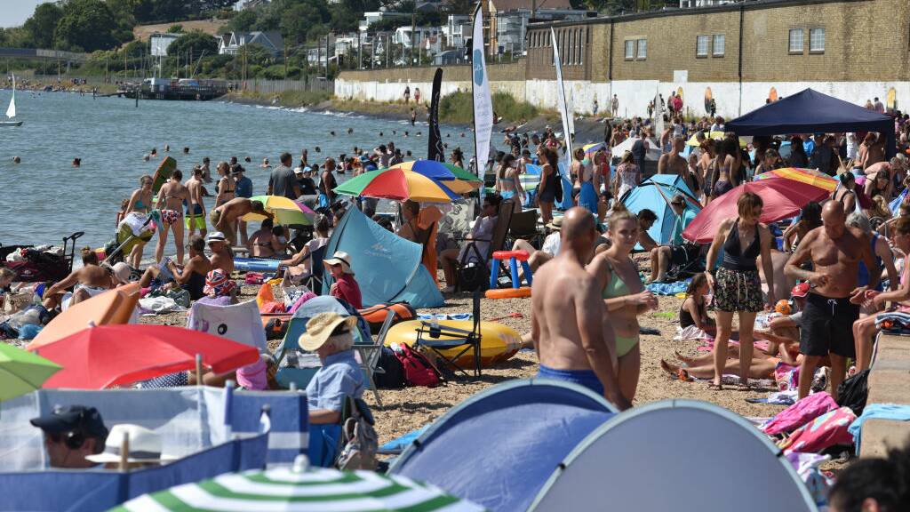 Crowds of people gather on Chalkwell beach in Southend during the extreme hot weather last month, which saw the Met Office issue an amber extreme heat warning for the country. Picture Getty Images
