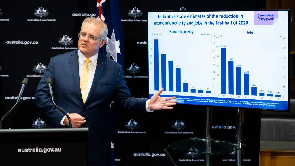 Scott Morrison talks to the media about opening Australia's borders to New Zealand. Picture: Getty Images