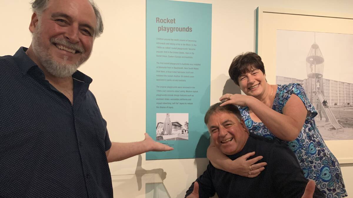 51 years, on David, Diana and Frank Masciulli are tickled pink to discover the photo of their childhood spaceship on display at a recent exhibition at the National Archives of Australia. Picture: Tim the Yowie Man