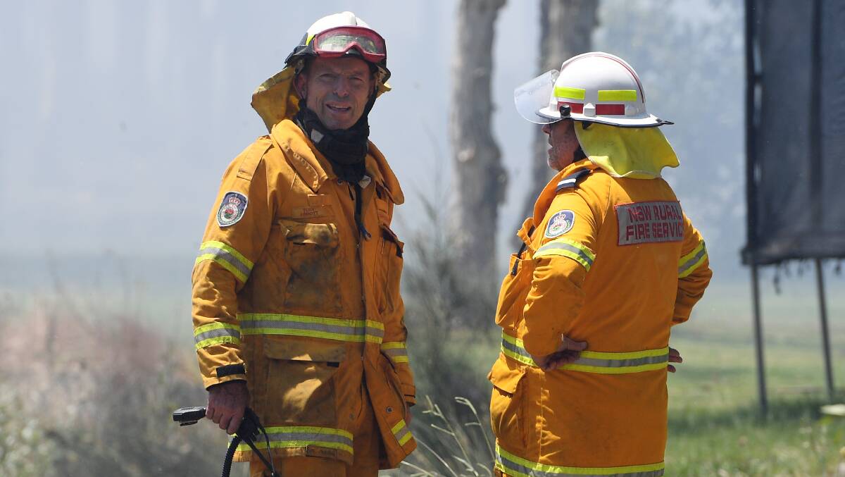 Tony Abbott has been played an active role in the NSW Rural Fire Service since leaving politics. Picture AAP