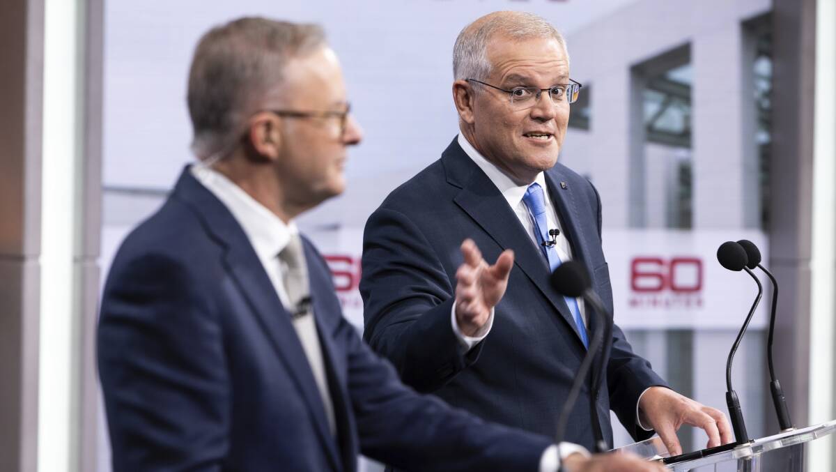 Anthony Albanese and Scott Morrison during the leaders' debate on Sunday night. Picture: Getty Images