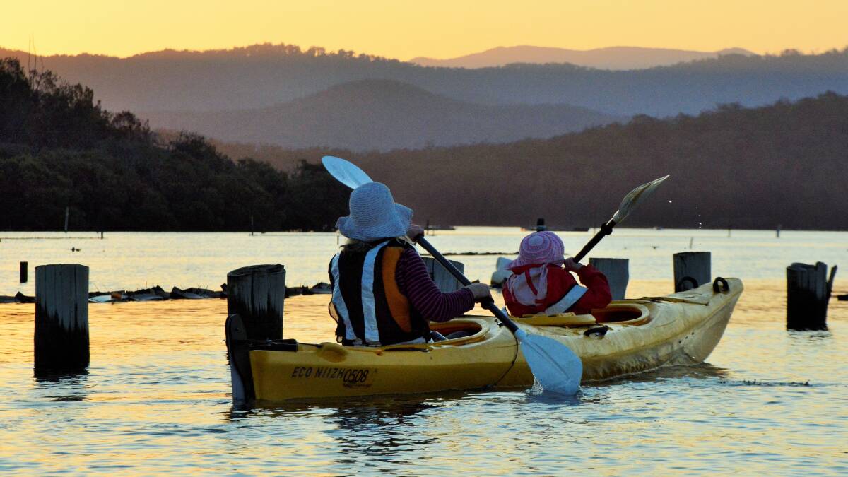 Paddling through the oyster leases near Budd Island on the Clyde River on sunset. Picture: Tim the Yowie Man