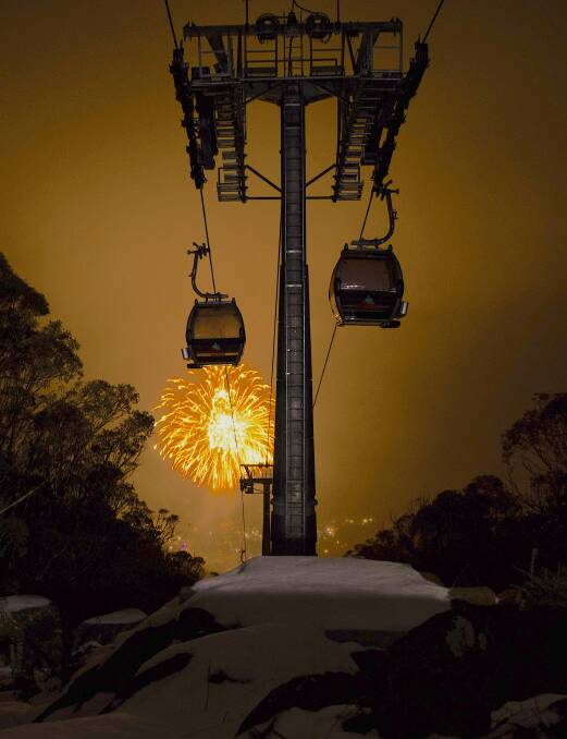 Fireworks light up the sky below Australias only alpine gondola at Thredbo. Picture: Supplied