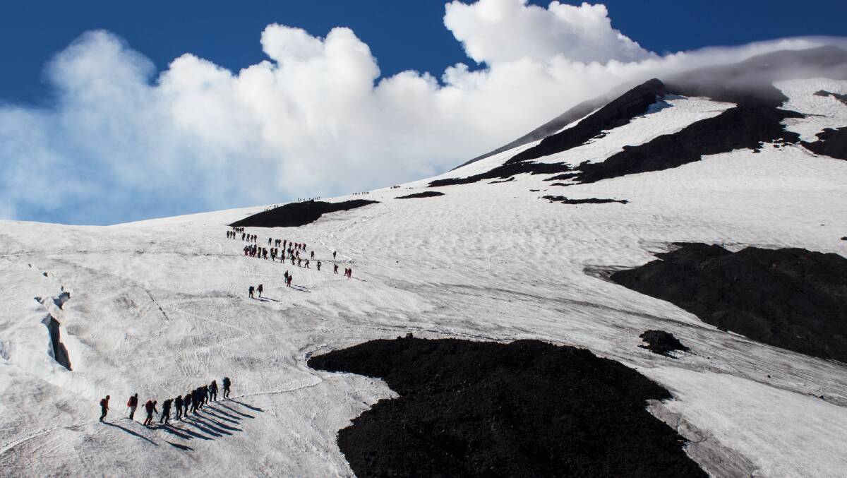 Climbing the 3000-metre-high active Villarrica volcano in Pucon, Chile. Picture: Michael Turtle
