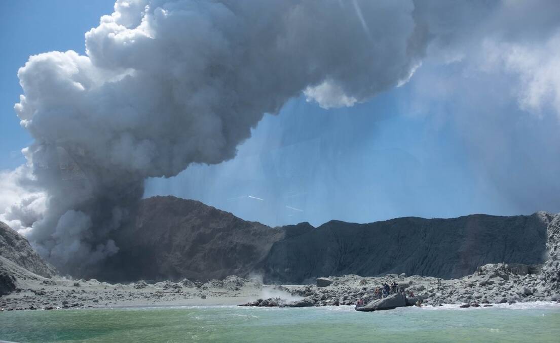 A sudden volcanic eruption on White Island has killed at least five people. Picture: Michael Schade