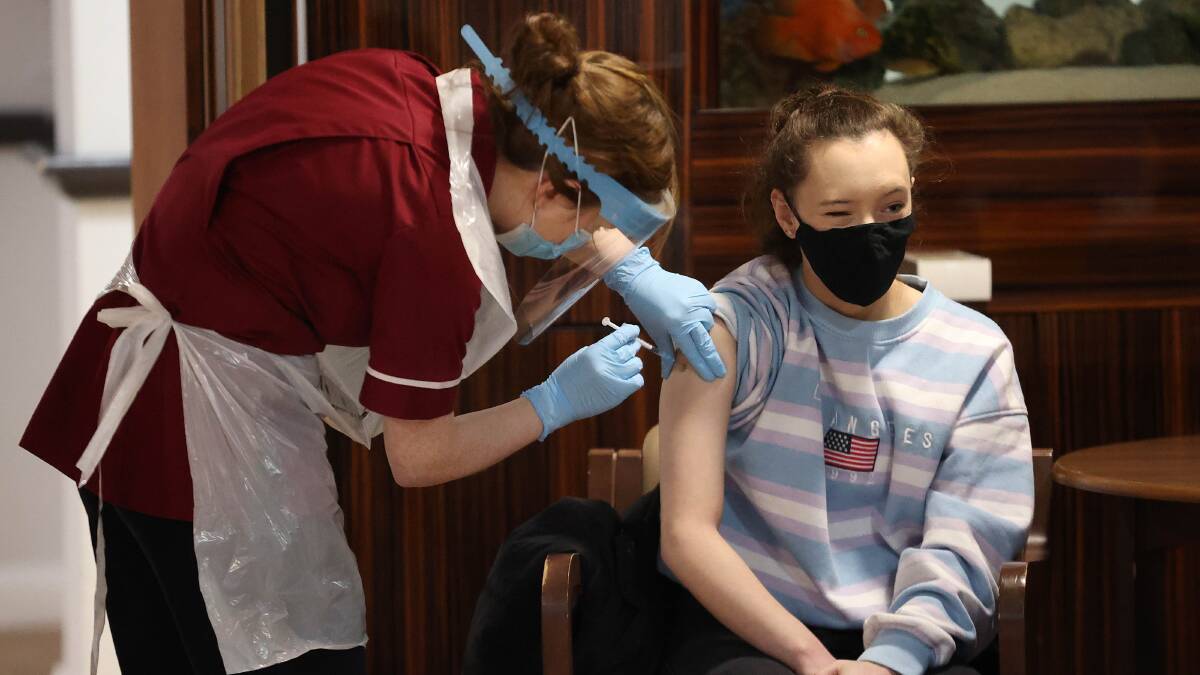 Care home staff in the UK receive the Pfizer/BioNtech COVID-19 vaccine on Wednesday. Picture: Getty Images
