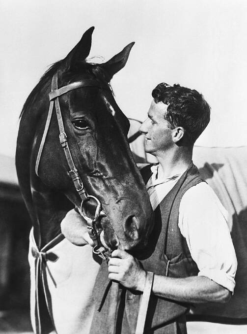 Phar Lap and trainer Tommy Woodcock in 1932. Phar Lap couldn't voice his opinion, which might have added to his popularity. Picture: Getty Images