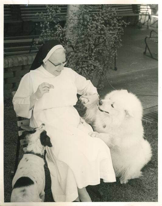 Sister Elizabeth with her husky Sasha. Picture: Supplied