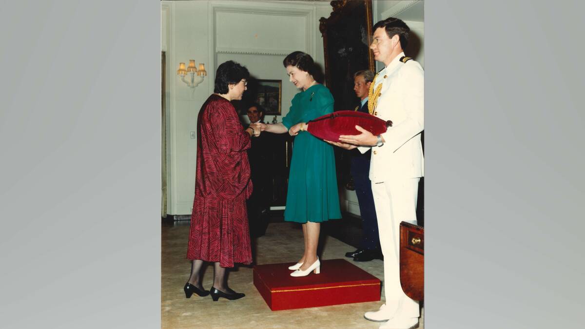 Judith Clingan sent in this photo from 1986. "I received my Order of Australia award from the hands of Her Majesty Queen Elizabeth I. Of course, I had bought a new outfit and new shoes. And, of course, I had to learn how to curtsey, which was a bit tricky with a bad knee. When I told Her Majesty I wrote and conducted music, especially with and for young people she replied 'How interesting'." Picture: Supplied
