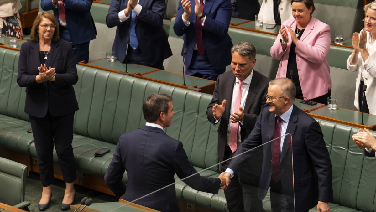 Prime Minister Anthony Albanese congratulates Treasurer Jim Chalmers after he delivered his budget on Tuesday. Picture Getty Images