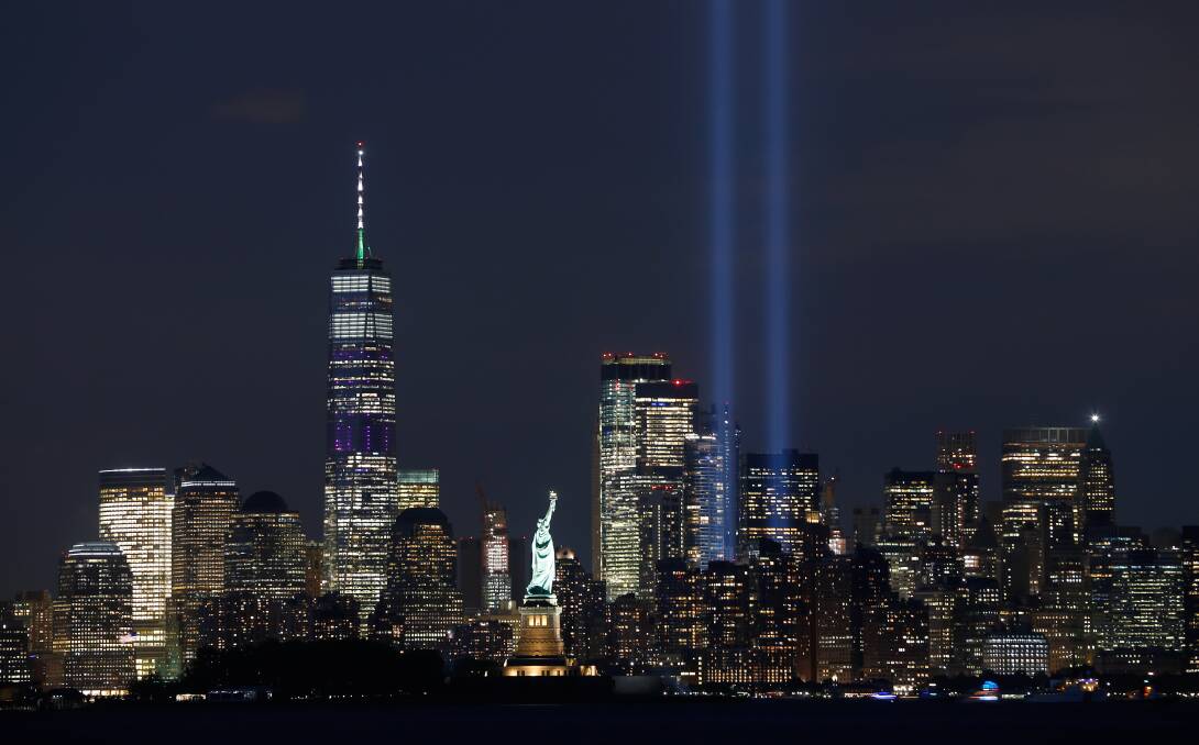 The annual tribute in light is illuminated on the skyline of lower Manhattan on the eve of the 18th anniversary of the 9/11 attacks in New York City. Picture: Getty Images