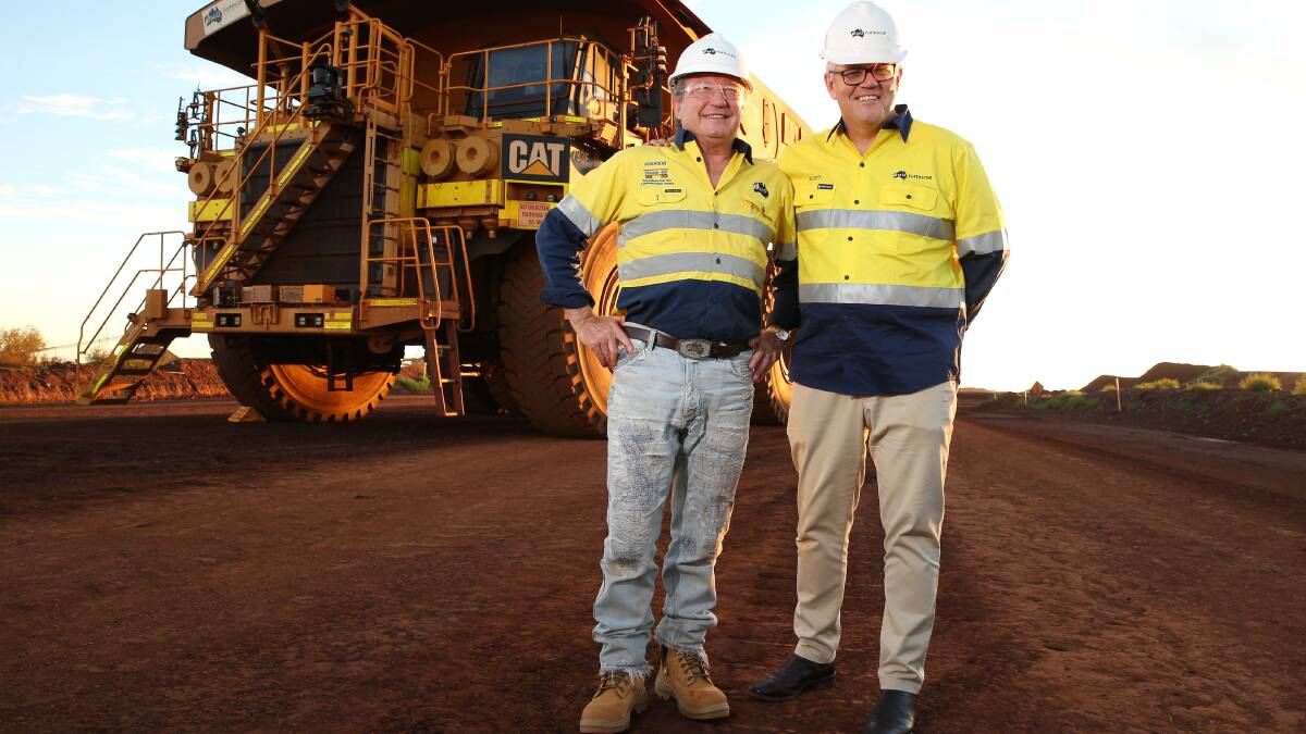 Fortescue Metals Group former CEO Andrew Forrest with Prime Minister Scott Morrison earlier this year. Fortescue has pledged to be carbon neutral by the end of the decade. Picture: Getty Images