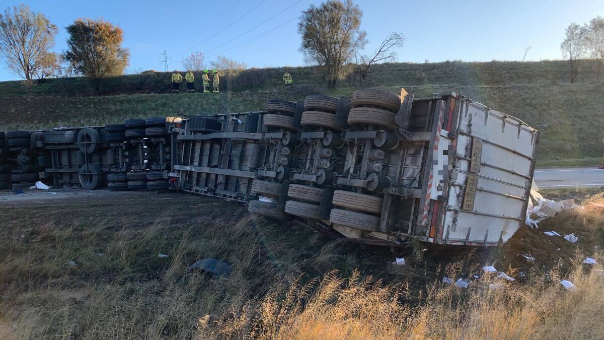 Truck rolled over on Hume Highway in Yass