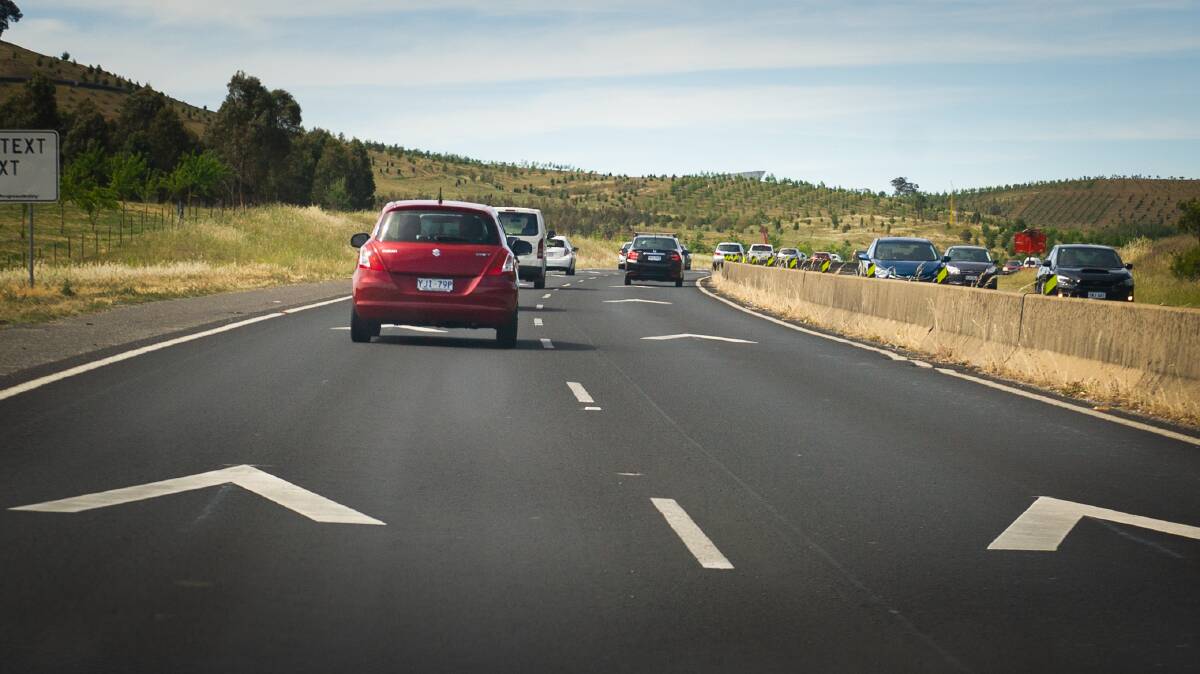 Peak hour traffic on the Tuggeranong parkway was hit with delays after a three vehicle collision. Picture: Elesa Kurtz