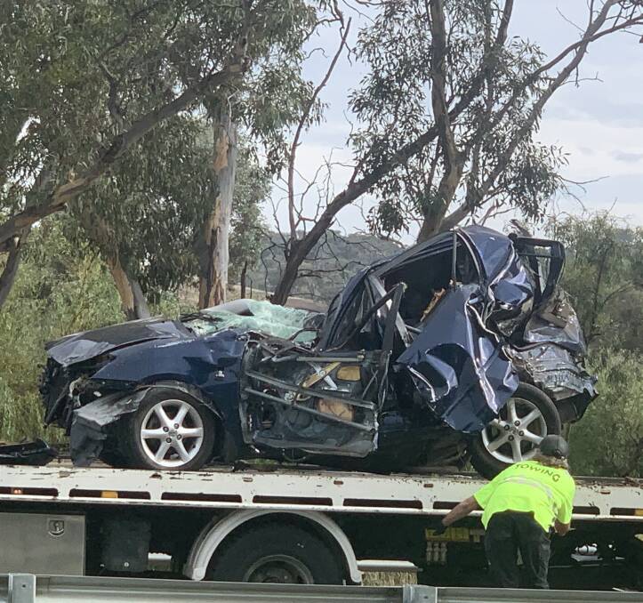A Toyota Corolla drove off the Monaro Highway and hit a tree. Picture: Julia Kanapathippillai