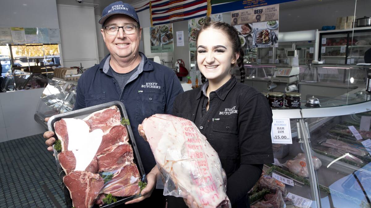 Evatt Butchers owner Darren Doblinger and apprentice Grace Zorzi. Picture: Sitthixay Ditthavong