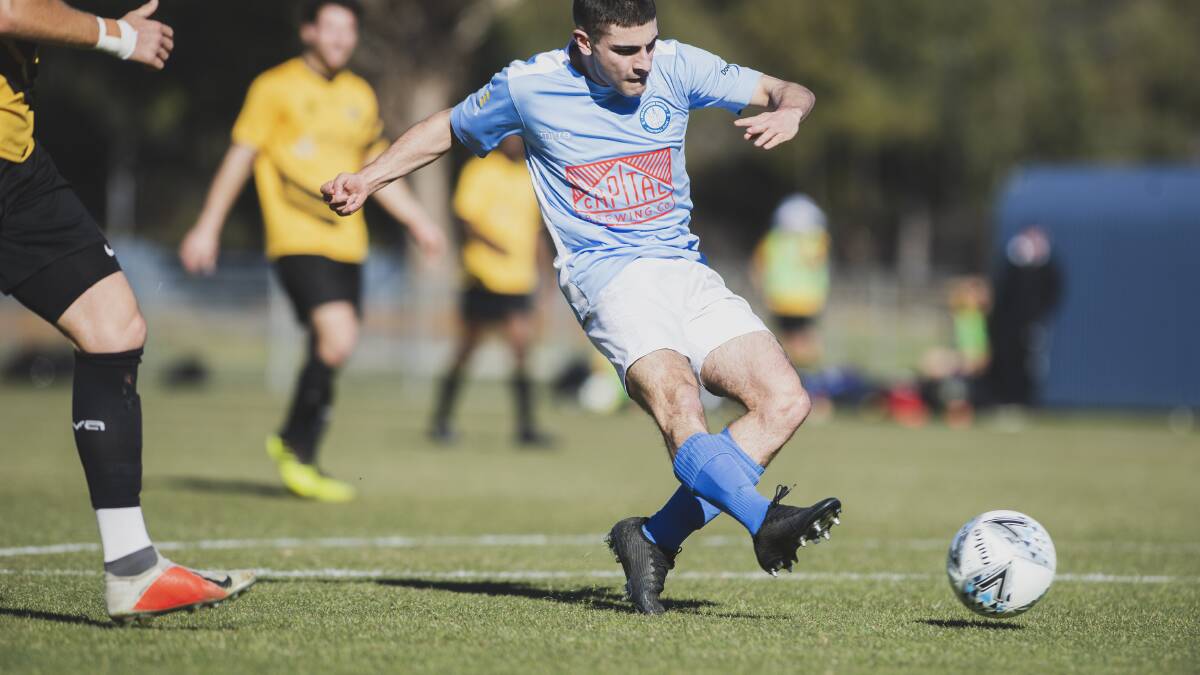 Luca Florez takes a shot on goal for Belconnen in Saturday's win over the Tigers. Picture: Dion Georgopoulos.