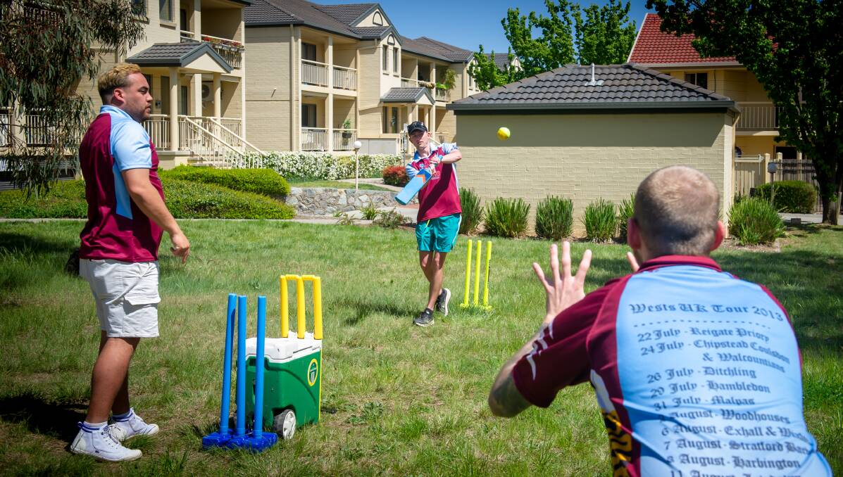 Ed Marshall, Connor Brown and Dave Kusetic dusted off the lockdown cobwebs with a game of backyard cricket on Saturday. Picture: Elesa Kurtz