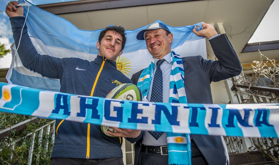 Pumas scrumhalf Tomas Cubelli with Argentina's ambassador to Australia, Hugo Gobbi. Picture: Karleen Minney.