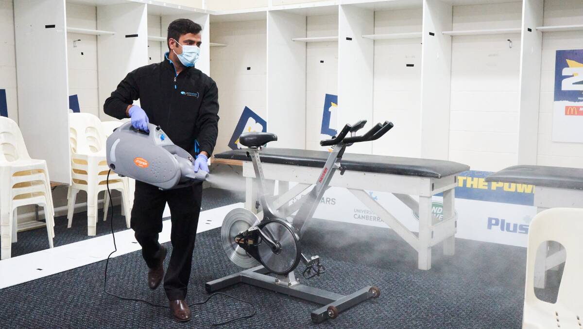 Ramesh from Quayclean cleans out the change rooms at Canberra Stadium. Picture: Matt Loxton