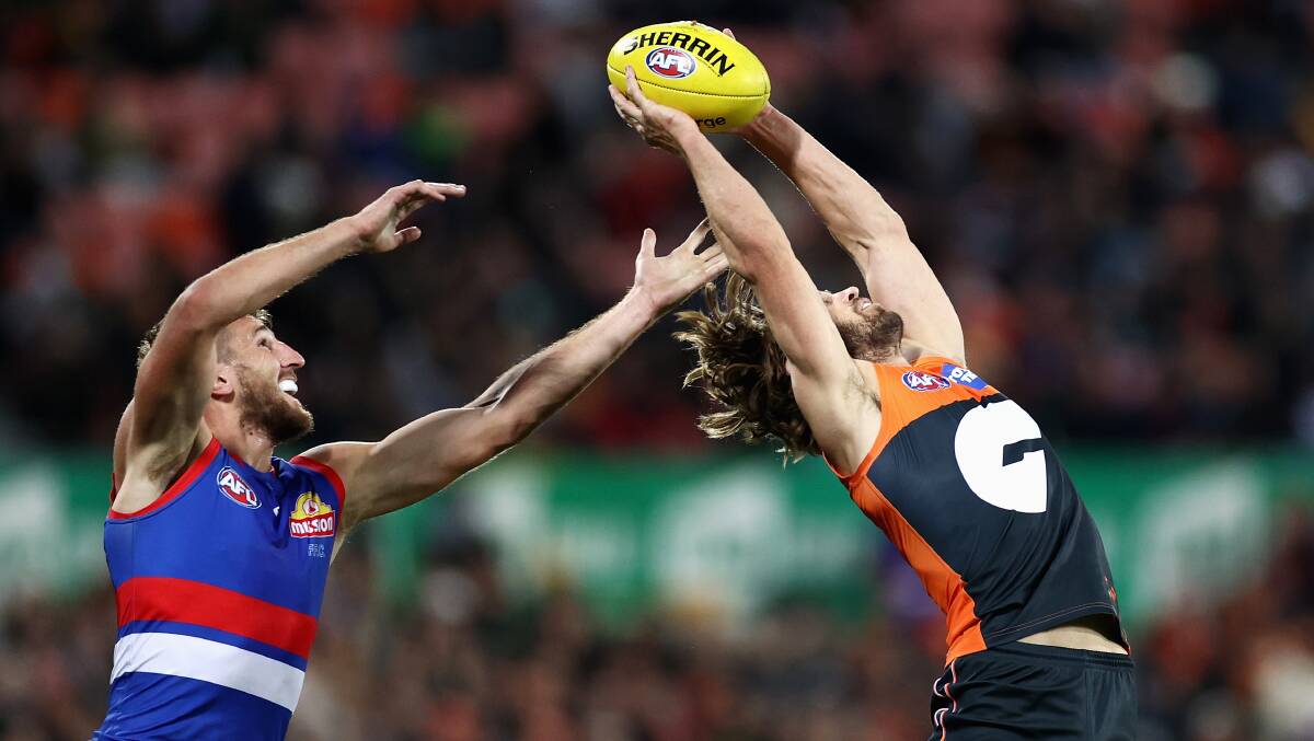 Callan Ward marks for the Giants in their most recent match at Manuka Oval. Picture: Getty