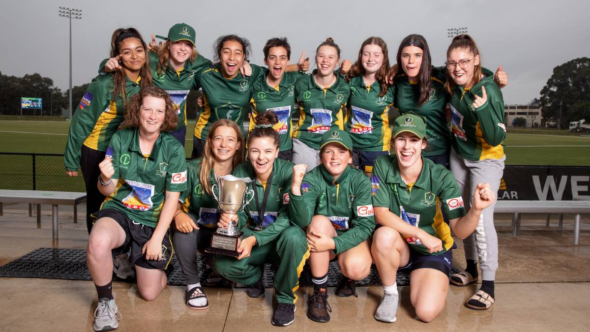 Weston Creek/Molonglo celebrate their Lynne O'Meara Cup success. Picture: Sitthixay Ditthavong