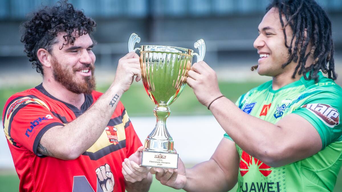 Tre Holton-Williams and Silafono Titiuti with the Canberra Raiders Cup. Picture: Karleen Minney
