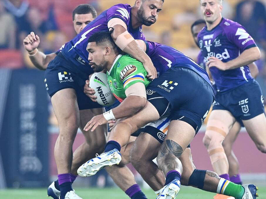 Siliva Havili is set upon by a pack of Melbourne Storm defenders. Picture: Getty Images.