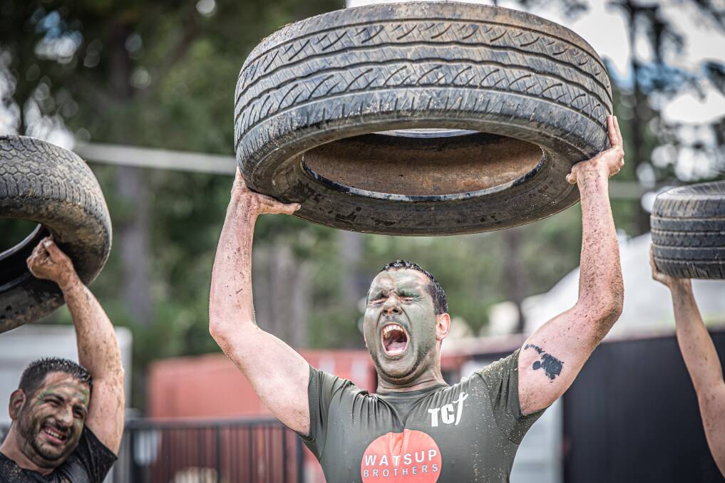 Recruit number 17 Nick Risteski, aka Raider Nick, battles away under the weight of a tyre. Picture: Karleen Minney