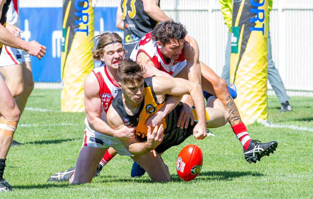 Queanbeyan Tiger Campbell Lovell gets rounded up by Eastlake on Saturday. Picture: Elesa Kurtz.