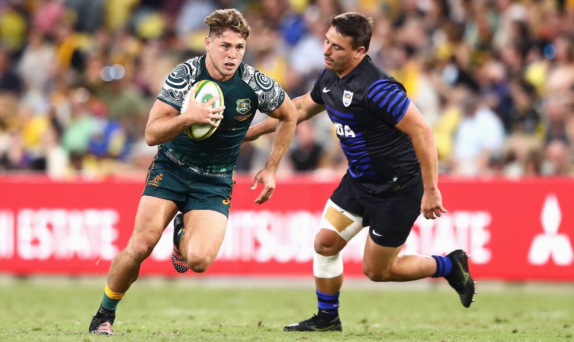Wallaby James O'Connor scoots away last weekend. Canberra boy Reuben Keane will help referee Saturday's clash between the two nations. Picture: Getty