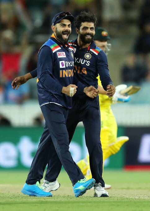 Virat Kohli and Ravindra Jadeja celebrate the prized scalp of Australian captain Aaron Finch. Picture: Getty
