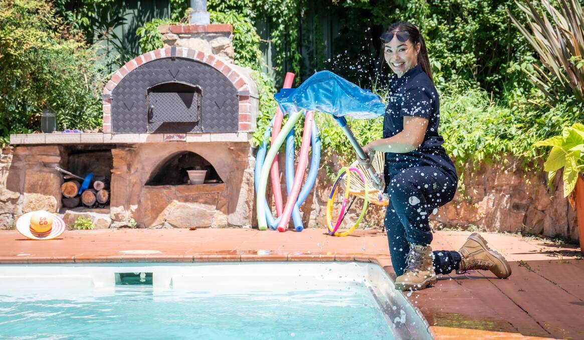 Tessa Jayne, of Blue Lizard Pool & Garden Services, in her happy place by the pool. Picture by Karleen Minney