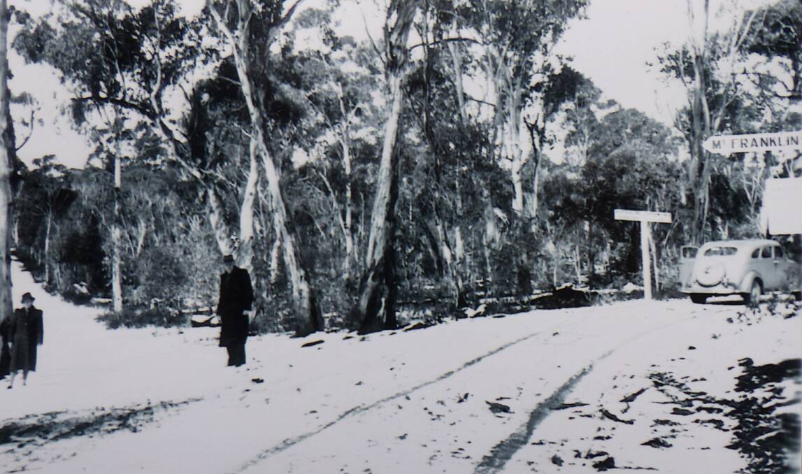 Annetta and Walter Dowling at the junction of the Mt Franklin and Brindabella roads in the 1940s, an intersection wryly referred to as Piccadilly Circus. Picture: Courtesy of the Dowling family