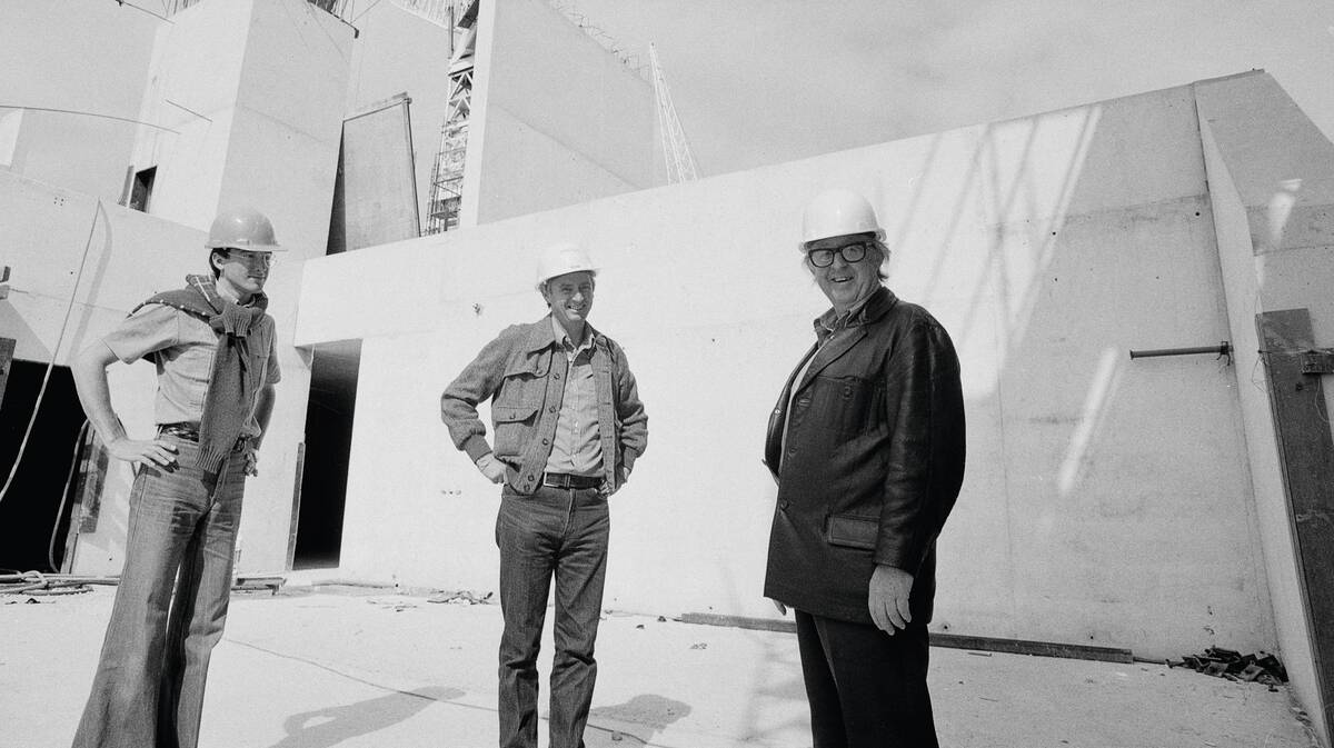 Architect Col Madigan, right, gallery director James Mollison, centre, and staff member Charles Manning, left, on site during construction, April 1978. Picture National Gallery of Australia Image Archive (Guy Madigan)