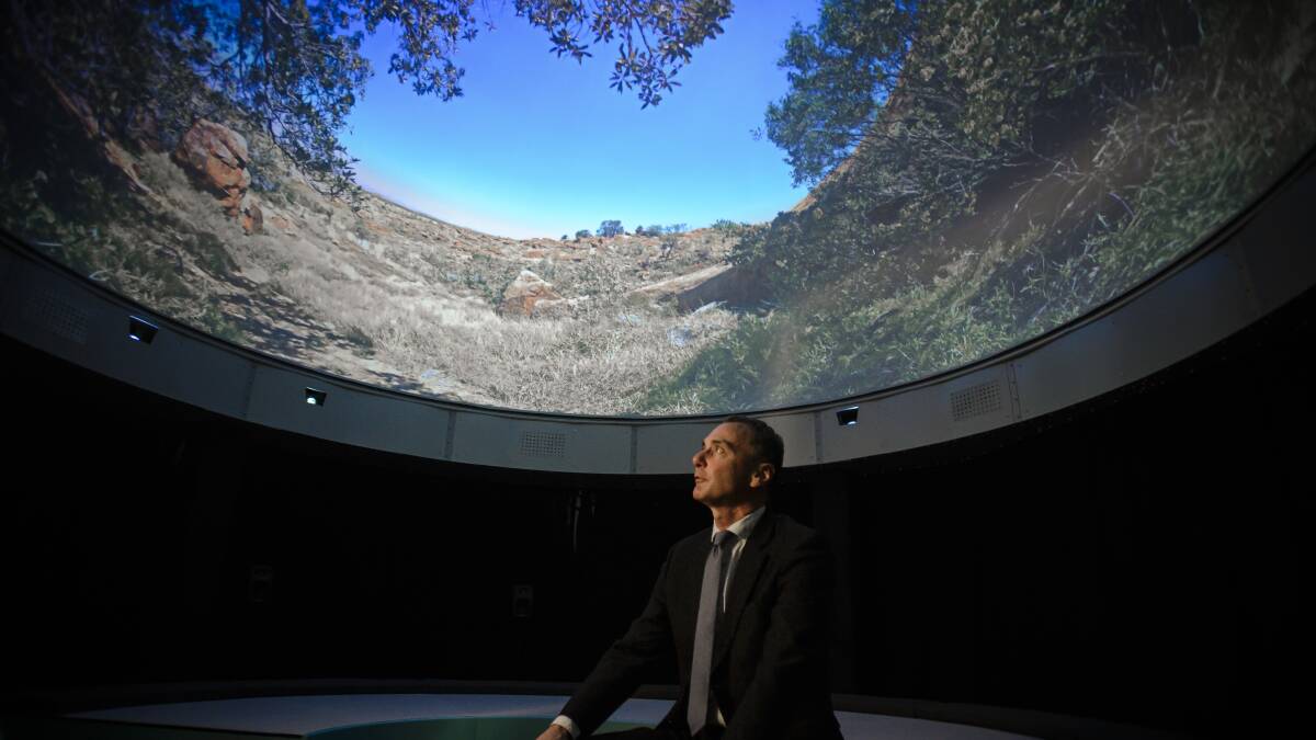National Museum of Australia director Mathew Trinca inside the Digital Dome, part of Songlines. Picture: Sitthixay Ditthavong