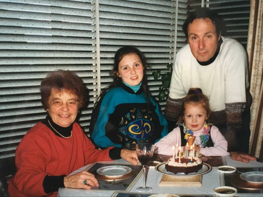 Here I am (front right) in another fun family photo looking like hostages because Grandma (left) baked. 